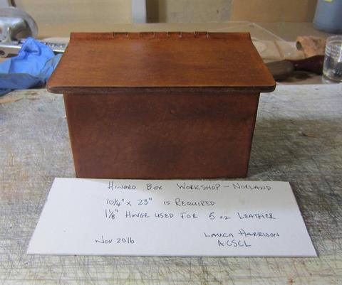 The sample box from the side, with its card