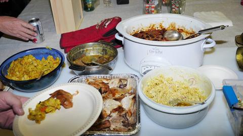 The pot-luck supper, served