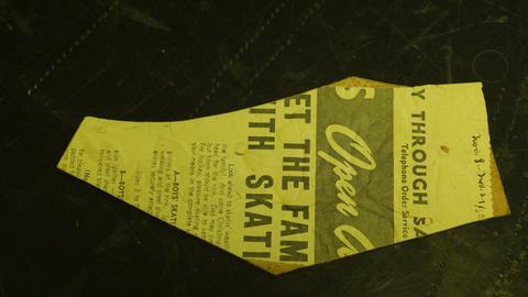 A practice piece taped to newspaper