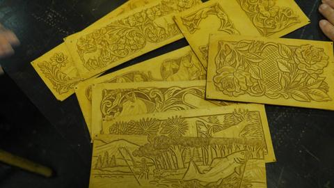 Carved panels laid out together