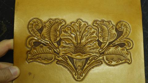 A carved floral centrepiece