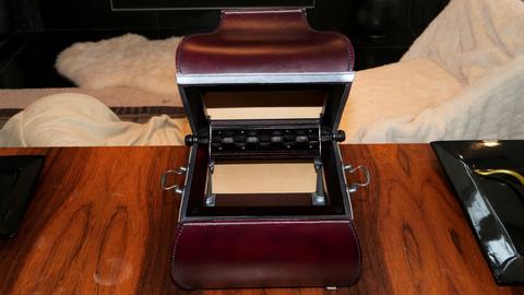 The case open, with its lined tray