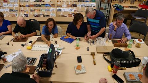 Members at work around the table