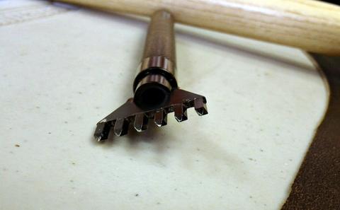 Back Quiver - leather carving and tooling, pewter casting, copper electroplating — photograph 39