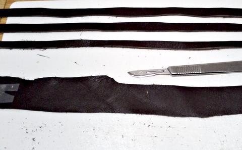 Back Quiver - leather carving and tooling, pewter casting, copper electroplating — photograph 108