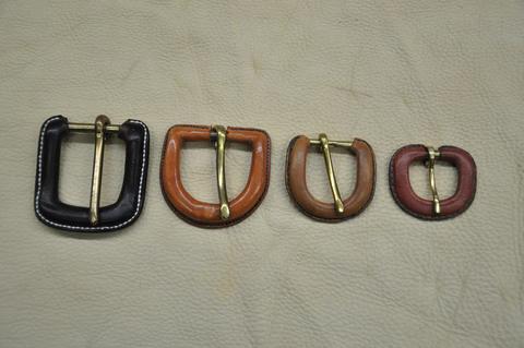 Leather-covered belt buckles, another of the 2014 Annual's workshops
