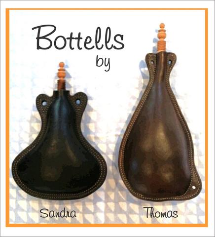 Two leather bottells, labelled “Sandra” and “Thomas”, made after the bottell workshop of September 2016