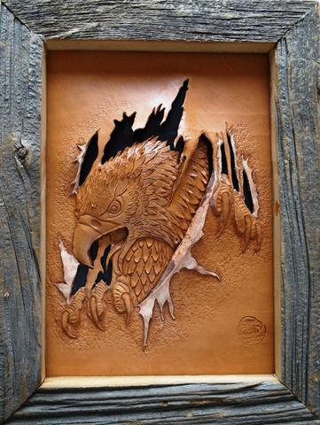 A carving of an eagle in a homemade barn-board frame, by Bob Baker, February 2017