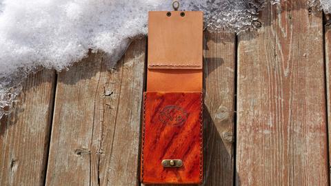 Leather tarot card case open, showing the flap and the card compartment