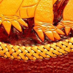 Lacing a leather edge