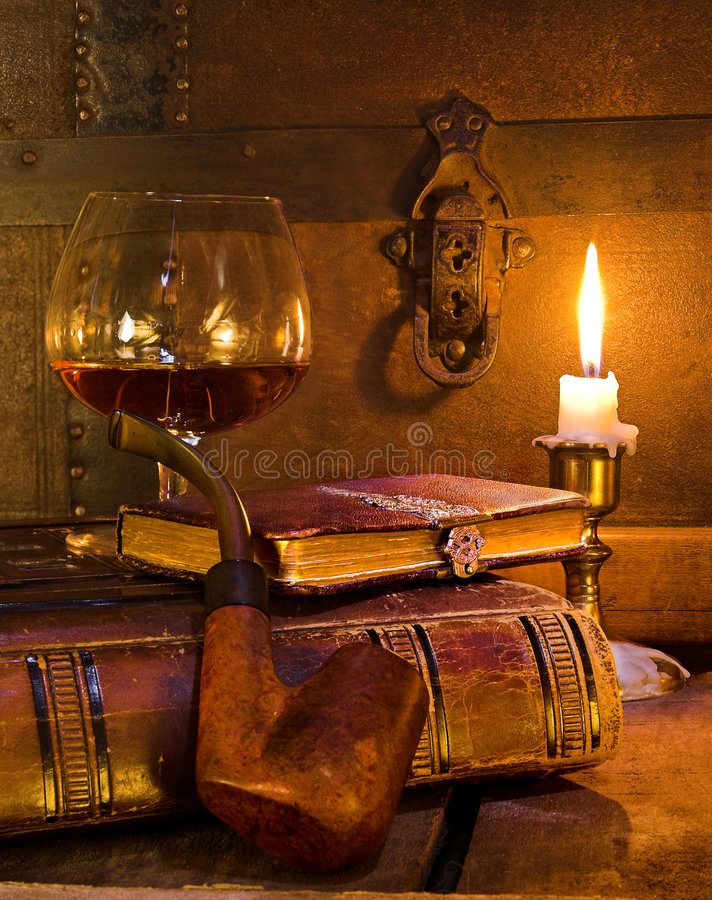 Book and pipe royalty free stock image